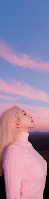 Free aesthetic bookmark featuring someone in a pink sweater looking at the sky